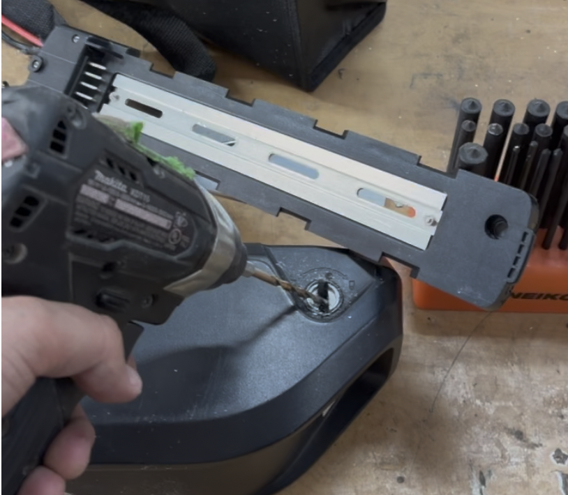 Drilling out the old lock after losing the key.