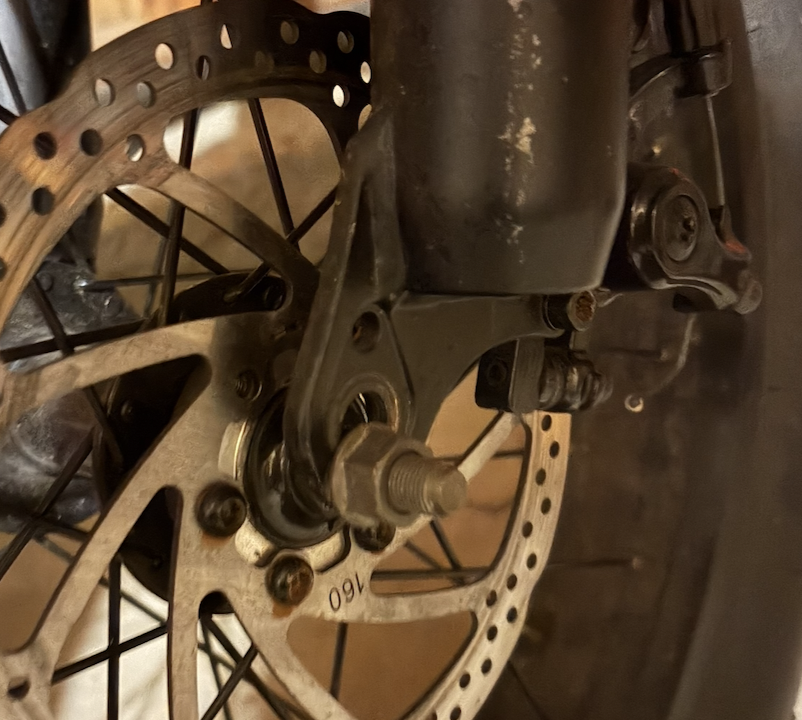 The loose front wheel hardware that nearly came off.