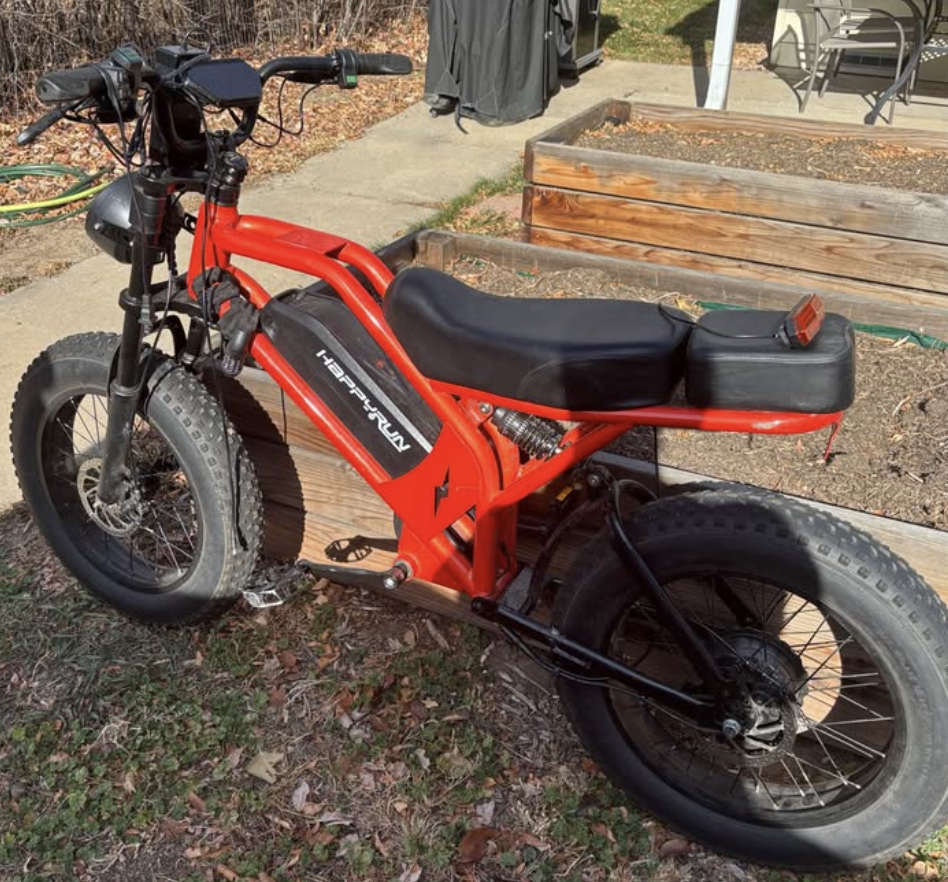 The red e-bike from the Marketplace listing.