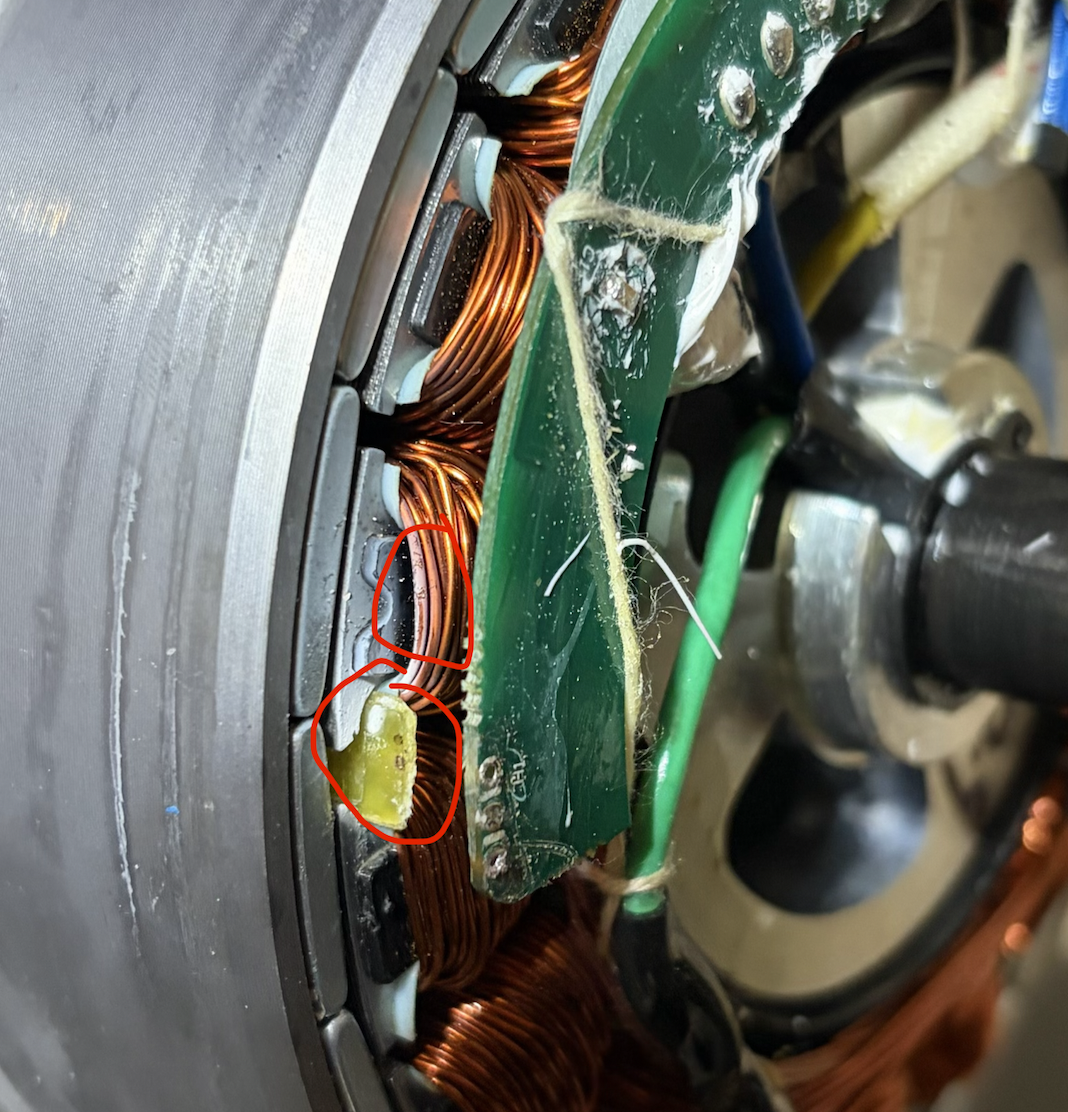 The exposed motor Hall board during repair.