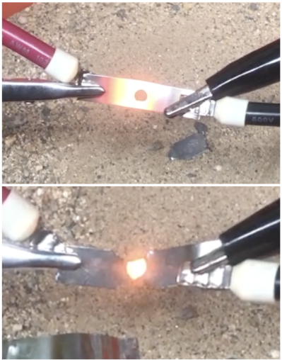 Two fuse links glowing under high-current testing.