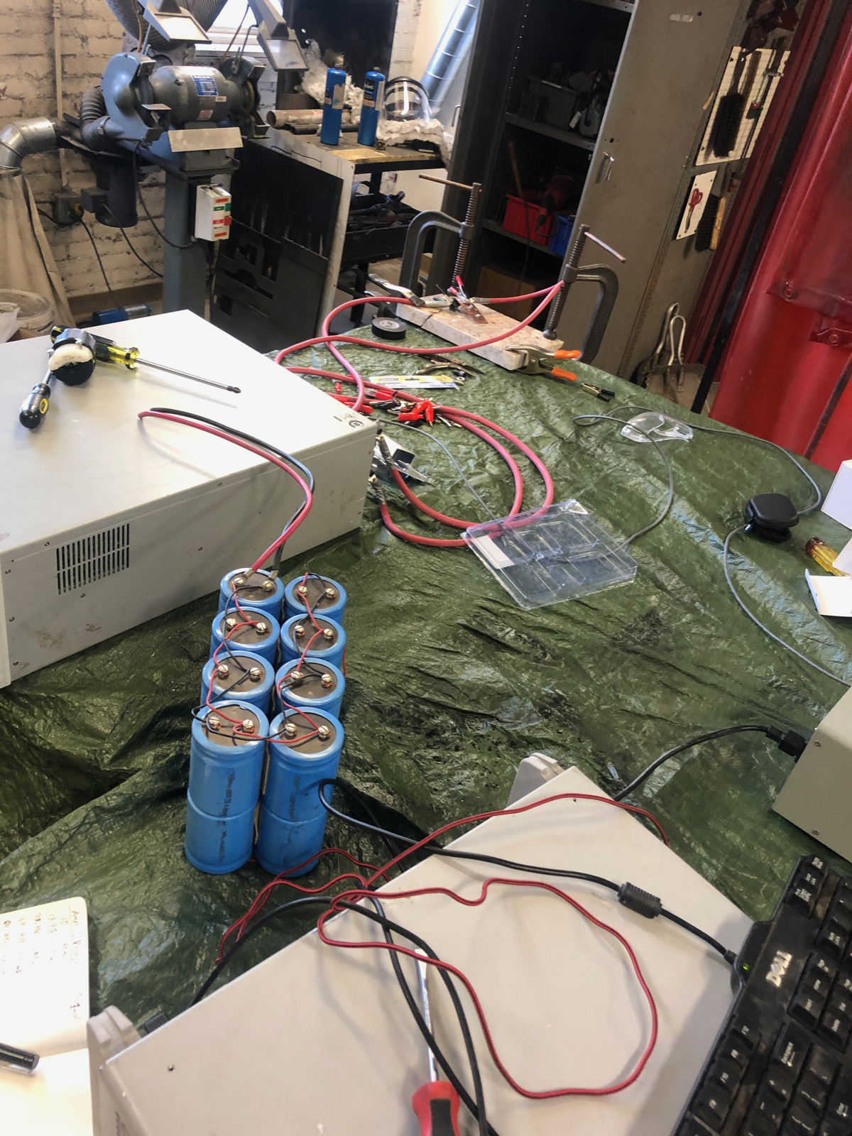 The capacitor-bank fuse test rig assembled on a workshop table.