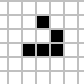 An animated glider moving across a Game of Life grid.